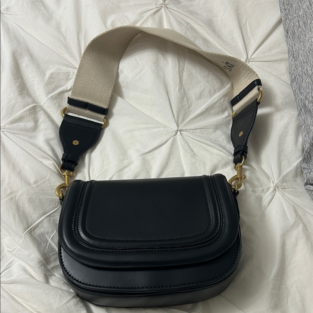 Zara Black Crossbody Saddle Bag with Cream Strap
